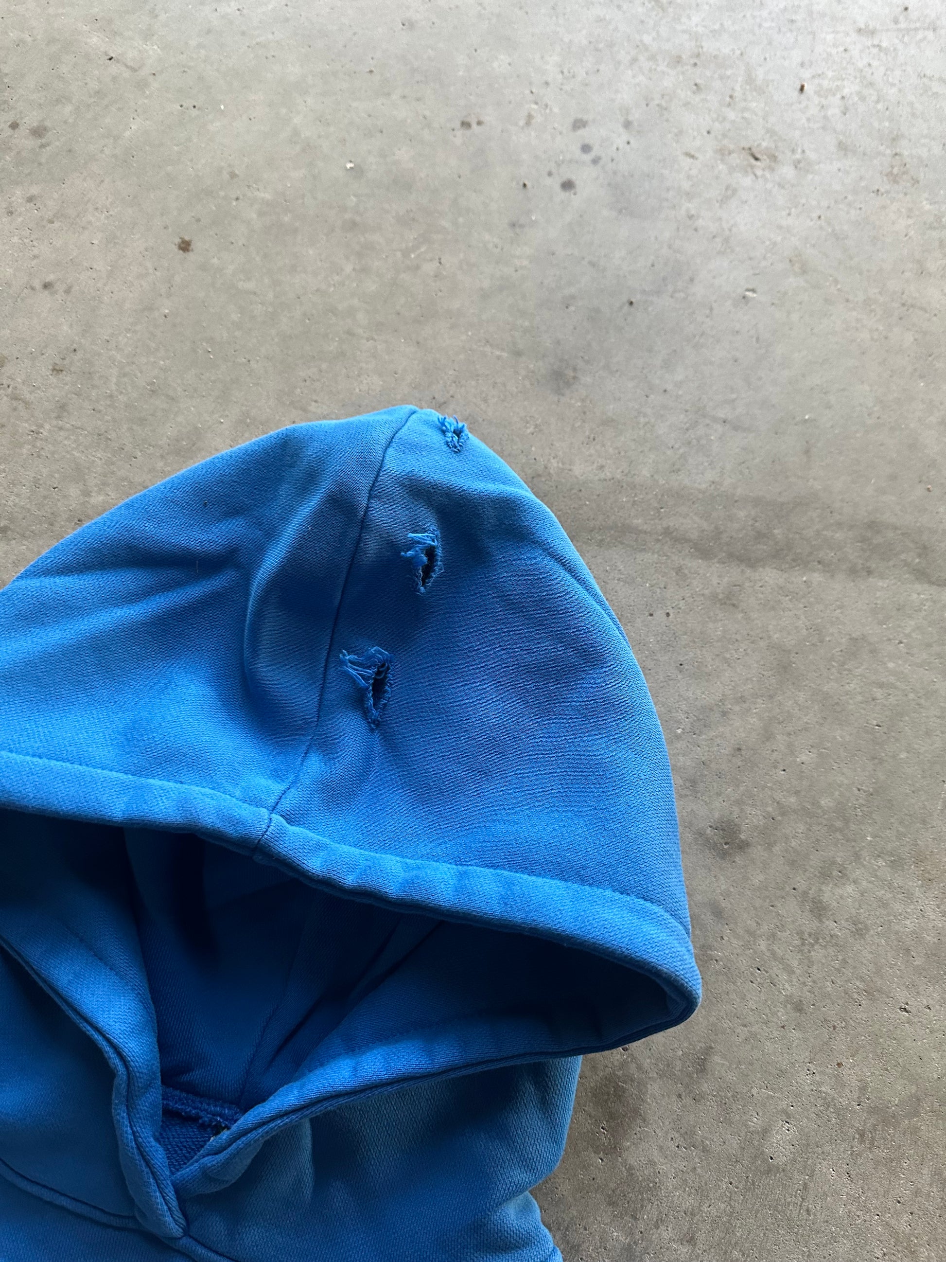 "ENIMIES PREYING ON THE WEAK" BLUE HOODIE